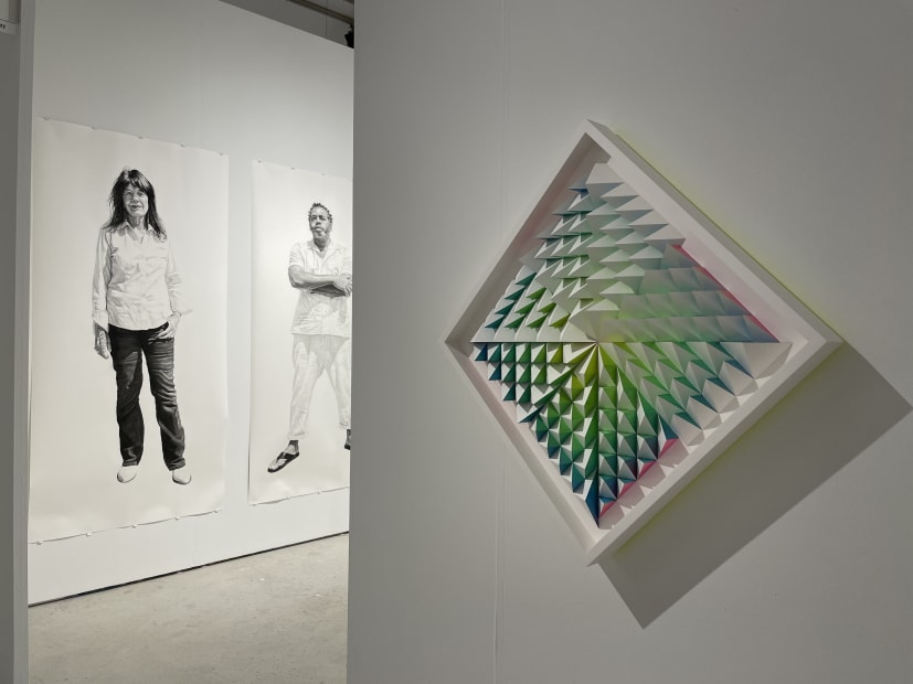 Installation image from Art Miami 2021 of Joel Daniel Phillips painting and Sean Newport's installation