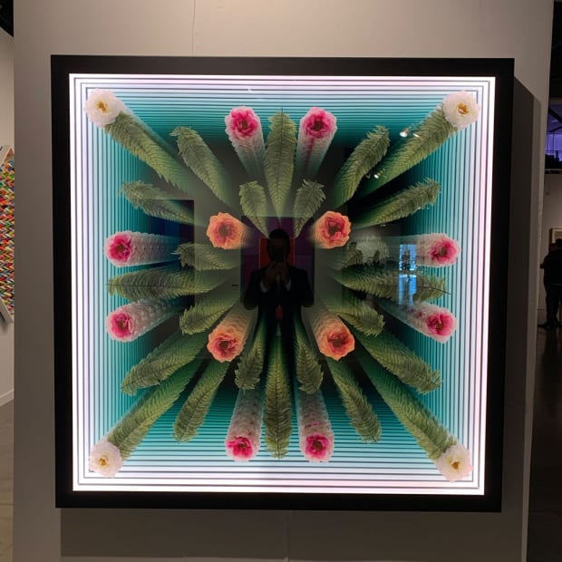 Installation image of Peter Gronquist's piece "Ferns and Roses" at a side view at the Seattle Art Fair 2019