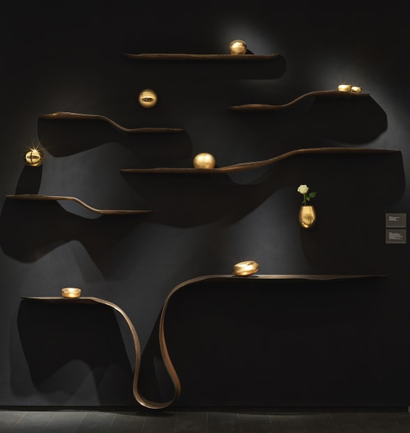 Adi's work installed at Masterpiece Art Fair 2022 displayed upon a set of bespoke Mokume-Gane shelves and console by Marc Fish