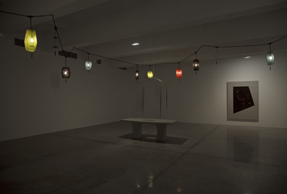 Boyce installation image at TBG NY, dark room with lanterns