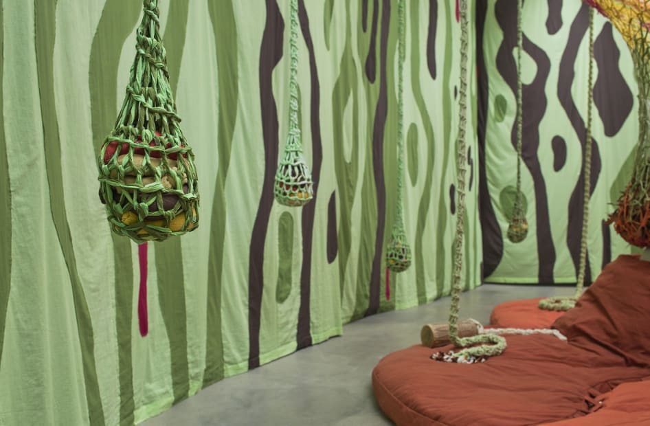 Ernesto Neto installation with instruments, hanging crochet