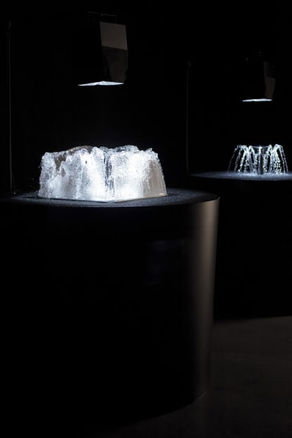 image of Eliasson "volcanos" made of water and light flashing