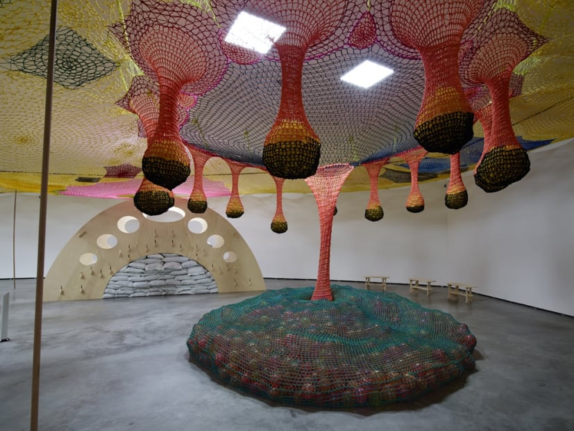 Crochet ceiling installation with instruments