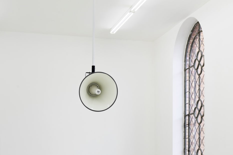 white speaker hanging from ceiling