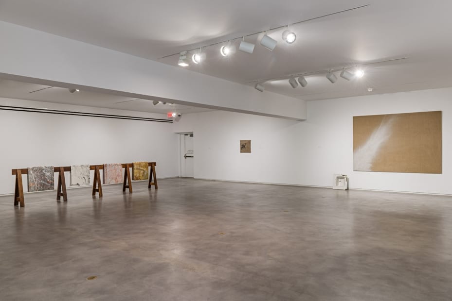 images of installation view of sculptures and paintings