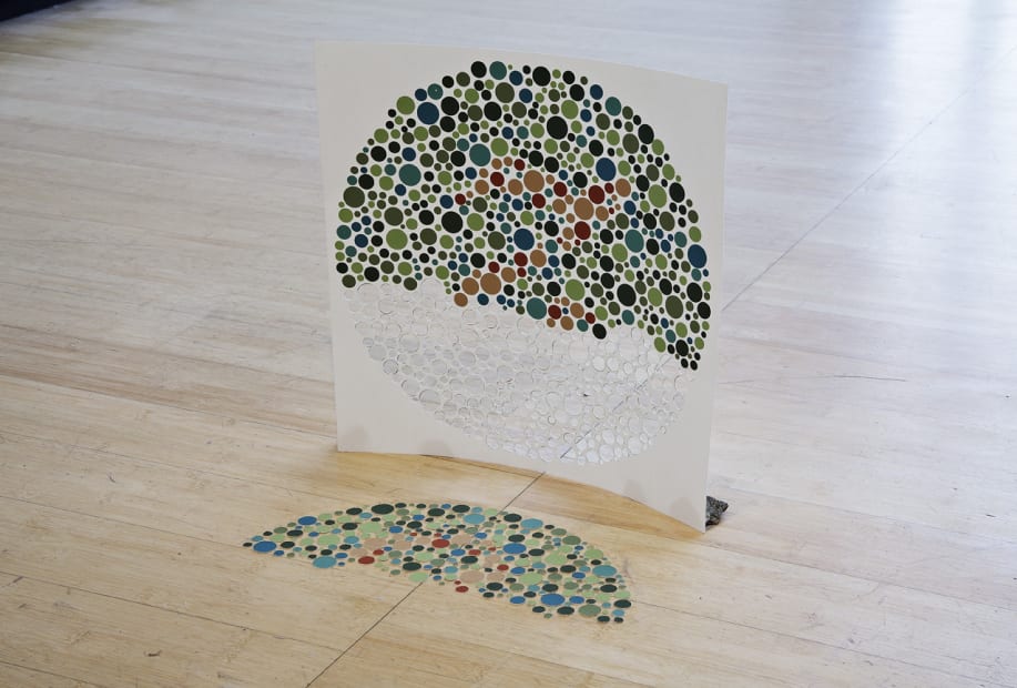 image of a paper sculpture on the floor