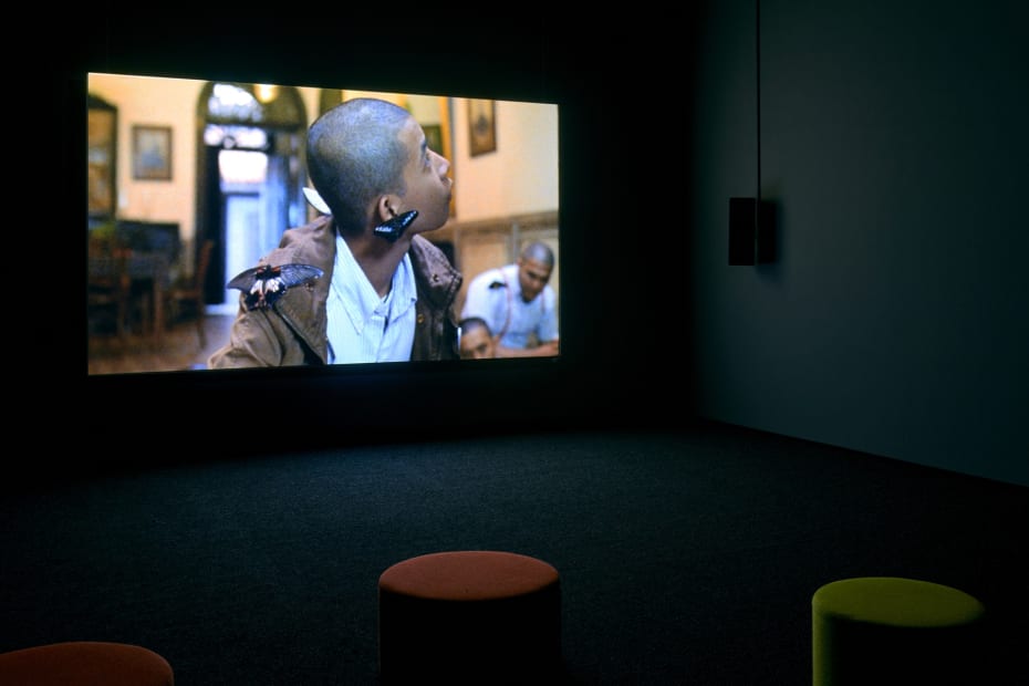Image of Phil Collins installation with video still