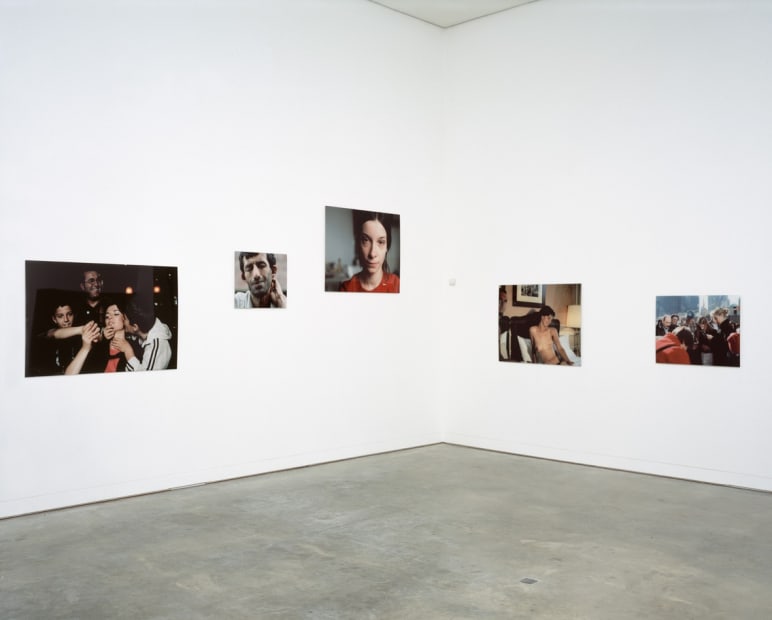 Image of an installation view of Phil Collins photographs