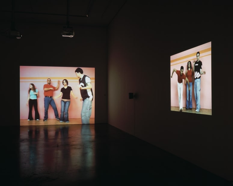 Image of an installation view of Phil Collins videos