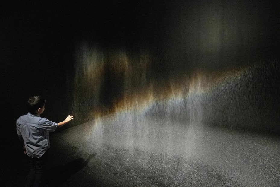 image of eliasson, dark room installation with water and light