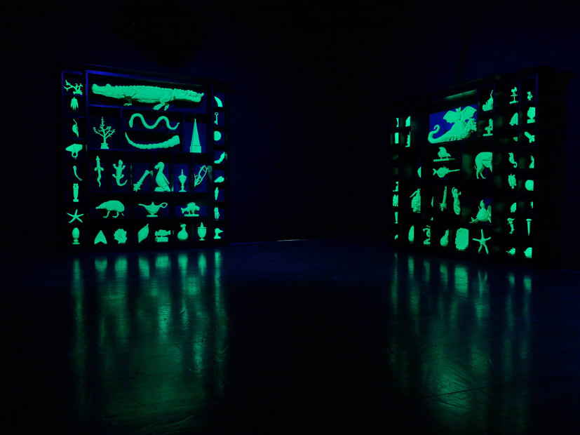 image of Mark Dion sculptures glowing in the dark