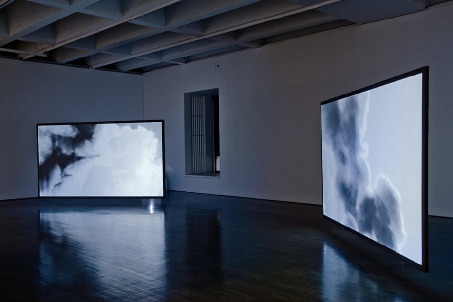 Installation view of Lisa Oppenheim exhibition, cloud projections