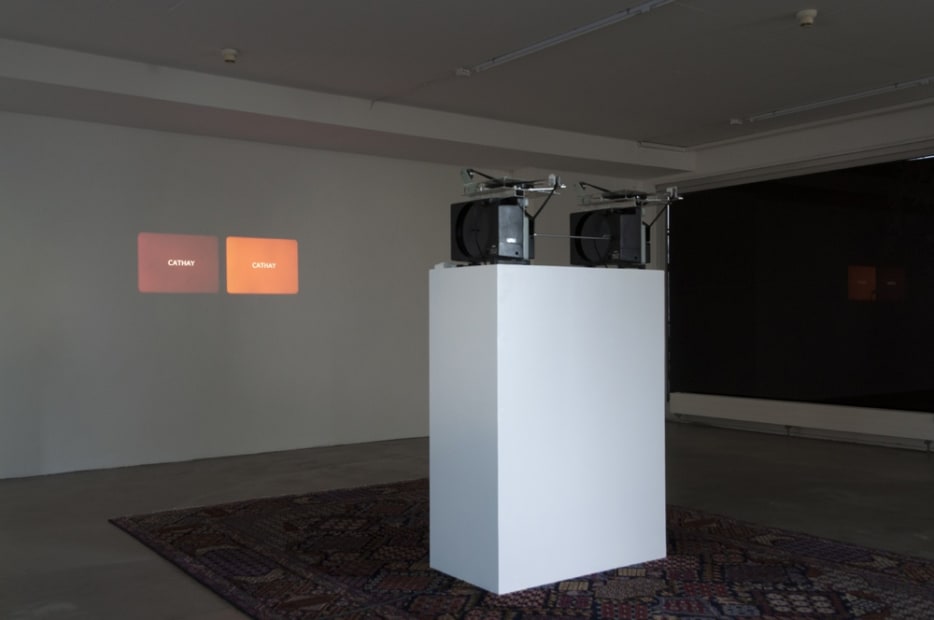 Installation image of Lisa Oppenheim projections
