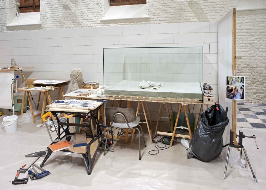 image of mark manders sculptures and studio set up inside a concrete room block