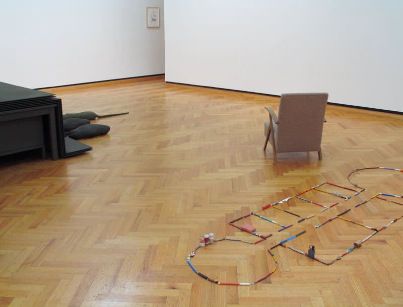 image of Mark Manders sculptures, installation with factory and chair