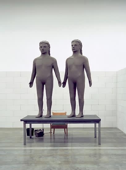 image of Mark Manders sculpture installation view at Documenta, two clay figures holding hands