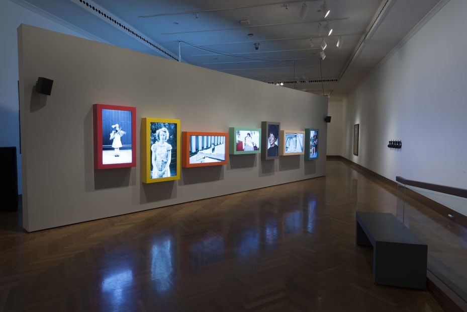 Image of Wearing installation, moving photographs in a row