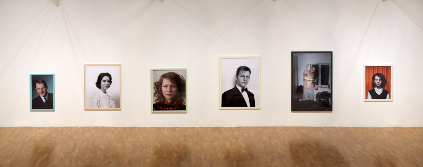 Installation view of Gillian Wearing at Whitechapel Gallery, London, me as family series of photographs