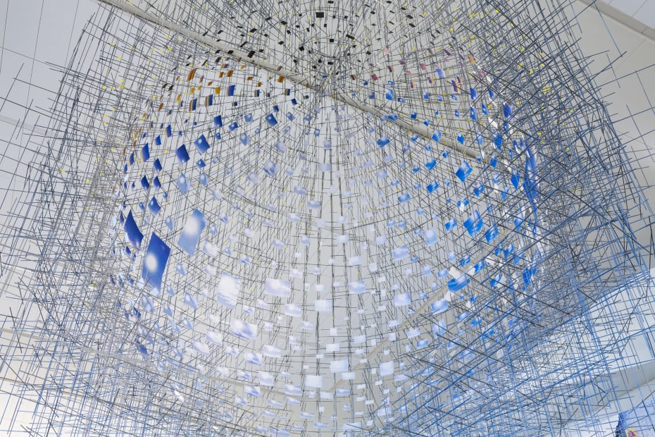 image of large Sarah Sze installation - small photos of the sun arranged in a sphere