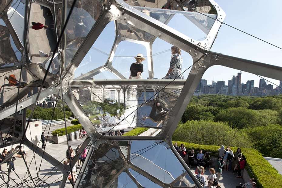 image of cloud cities installation on the Met rooftop, with people interacting with it