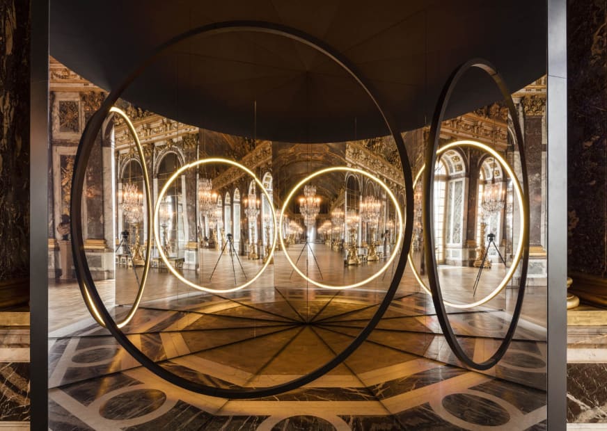 image of mirror and circular light sculpture