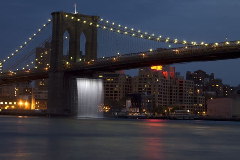 image of waterfall underneath Brooklyn Bridge