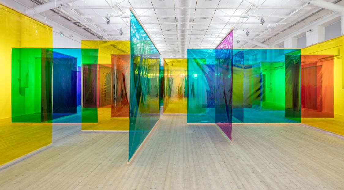 Image of a room with colorful transparent dividers