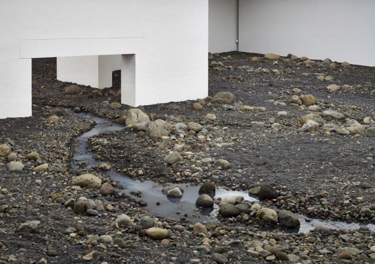 image of Olafur Eliasson installation, riverbed inside of museum