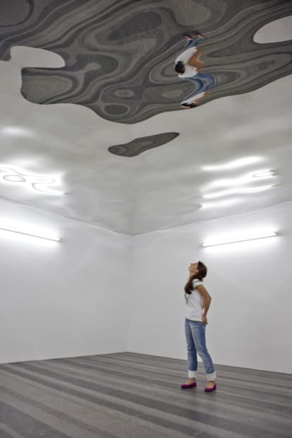 image of wavy mirrored ceiling