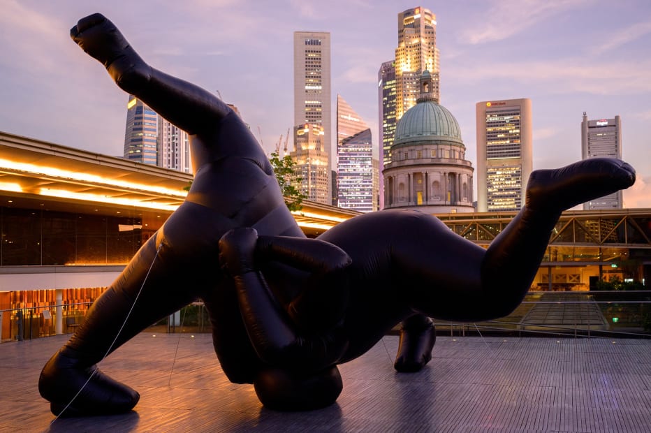 Shilpa Gupta's Untitled inflatable sculpture installed outdoors with cityscape backdrop