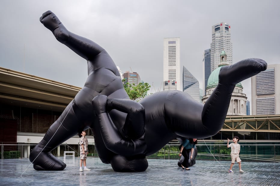 Shilpa Gupta's Untitled inflatable sculpture installed outdoors with cityscape backdrop