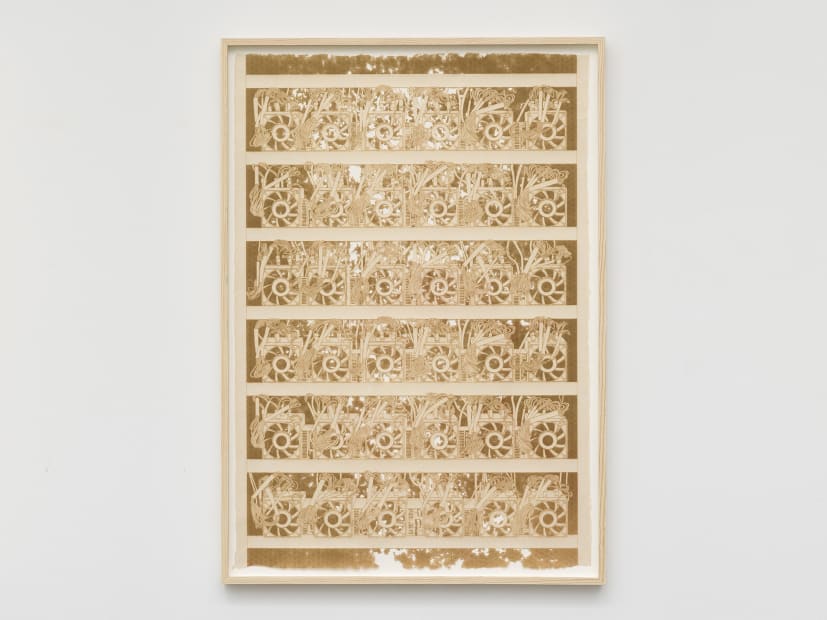wooden sculpture on white wall