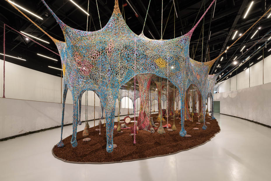 Installation view of ERNESTO NETO: Nosso Barco Tambor Terra [our boat drum earth].