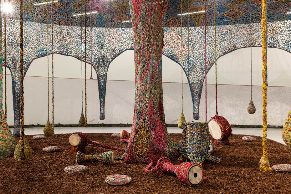 Installation view of ERNESTO NETO: Nosso Barco Tambor Terra [our boat drum earth].