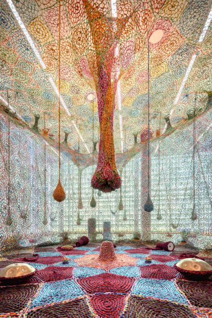 Installation image of Ernesto Neto: The Birth of Contemporous Blue Tree.
