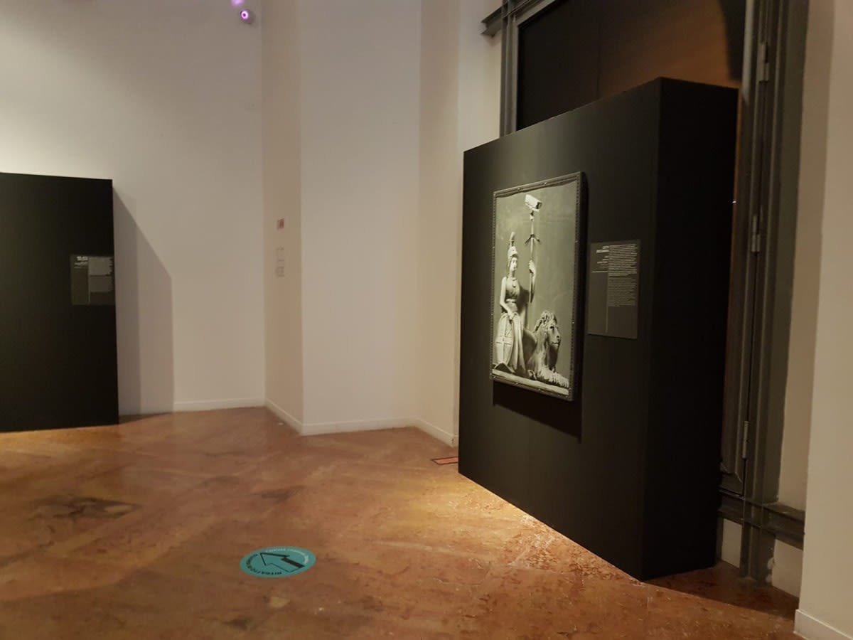 Banksy artworks hanging on wall