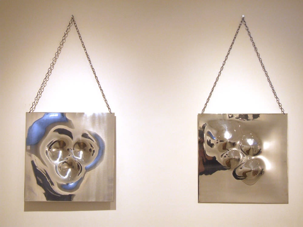 Banksy artworks hanging on wall