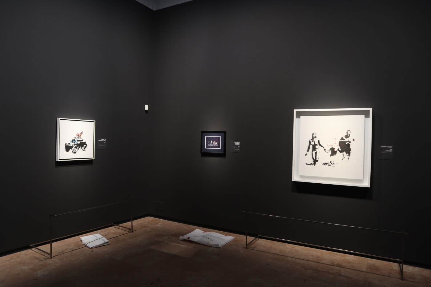 Banksy artworks hanging on wall