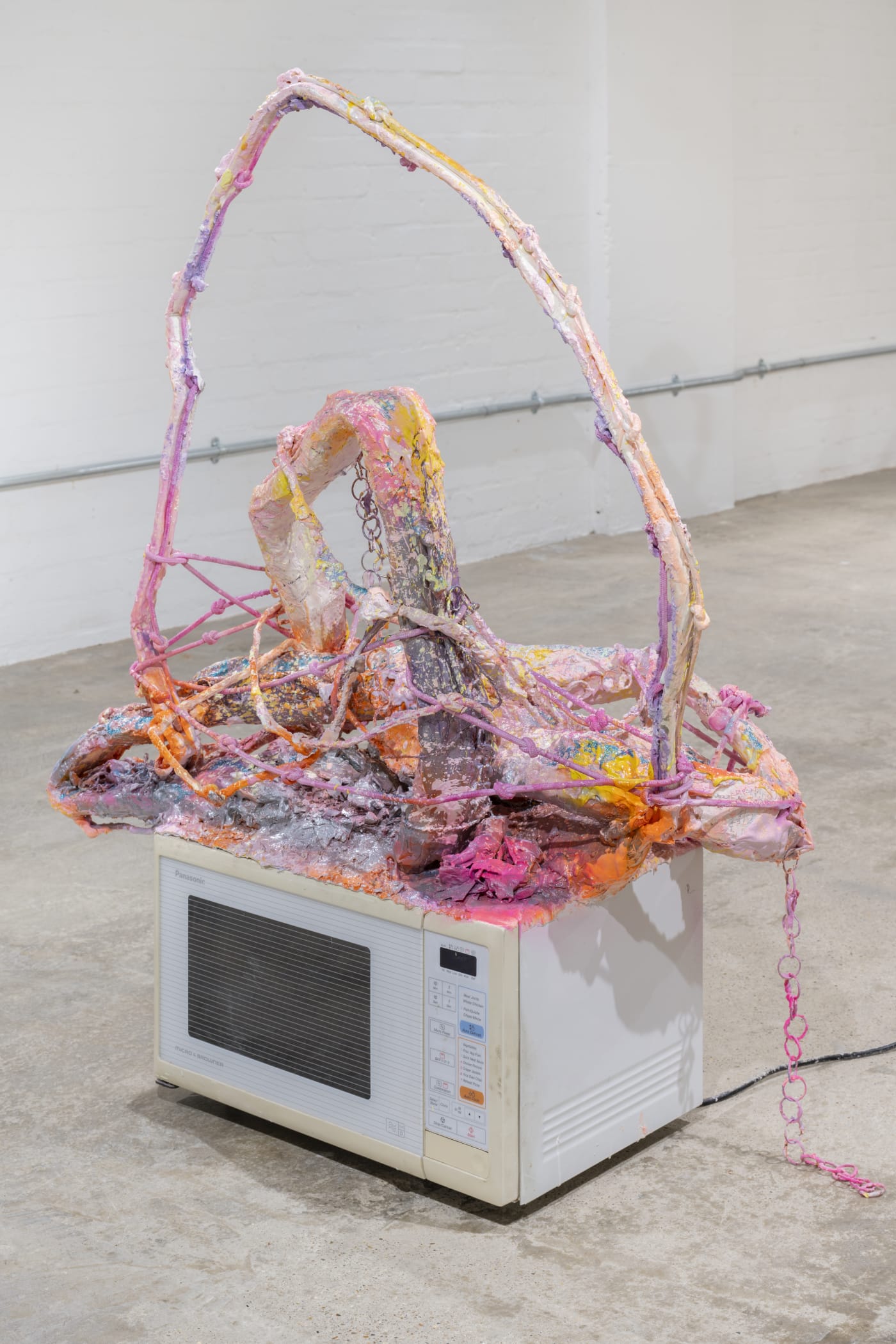 Rosie Reed, Kitchen Scenes (Holding on to Me and You), 2023, microwave, plaster, jesmonite, paint, pigment, eco-glitter, keyrings and rope, 115 x 85 x 34 cm