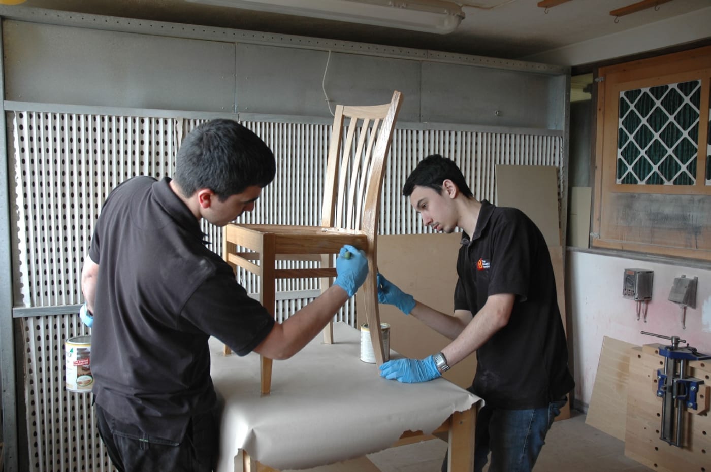 Paulo and Doug applying an oil polish