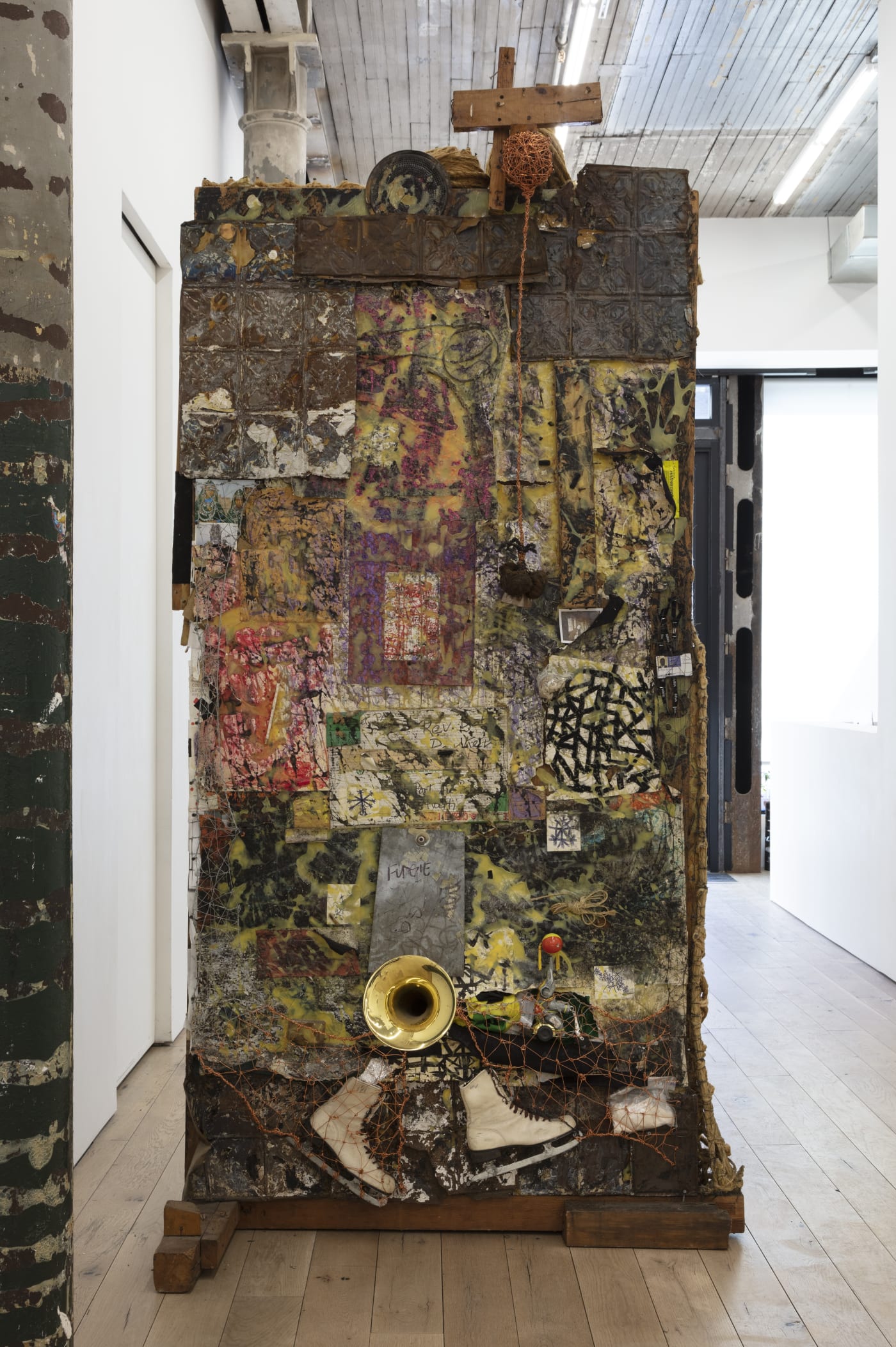 Arthur Simms Ego Sum, Portrait of Arthur Simms as a Junk Collector, 1994 Rope, wood, glue, wire, screws, metal, charcoal, markers, pen, pencil, ice skates, horn, paper, photos, felt, bell, artist’s fingernails, and toys 115 x 56 x 50 in 292.1 x 142.2 x 127 cm