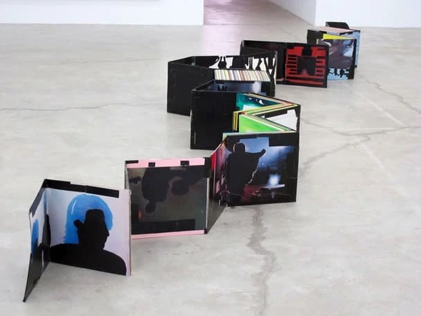 Jim Lambie Stakka Record Covers, 1999 record covers, tape, acrylic paint dimensions variable