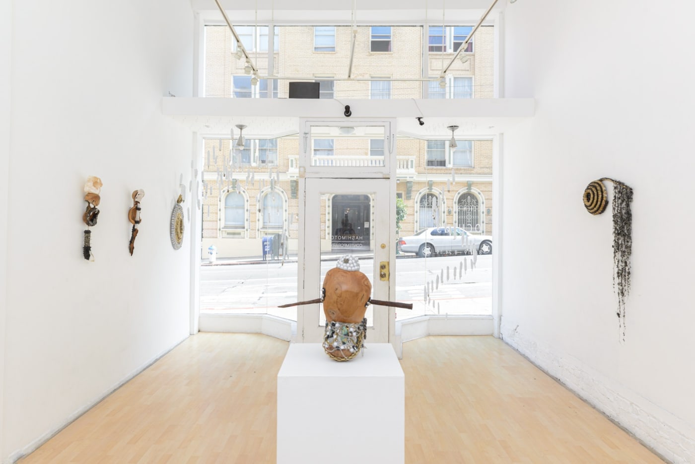 Installation view of Lucien Shapiro's solo show "Oculus", featuring found-object ritual sculptures