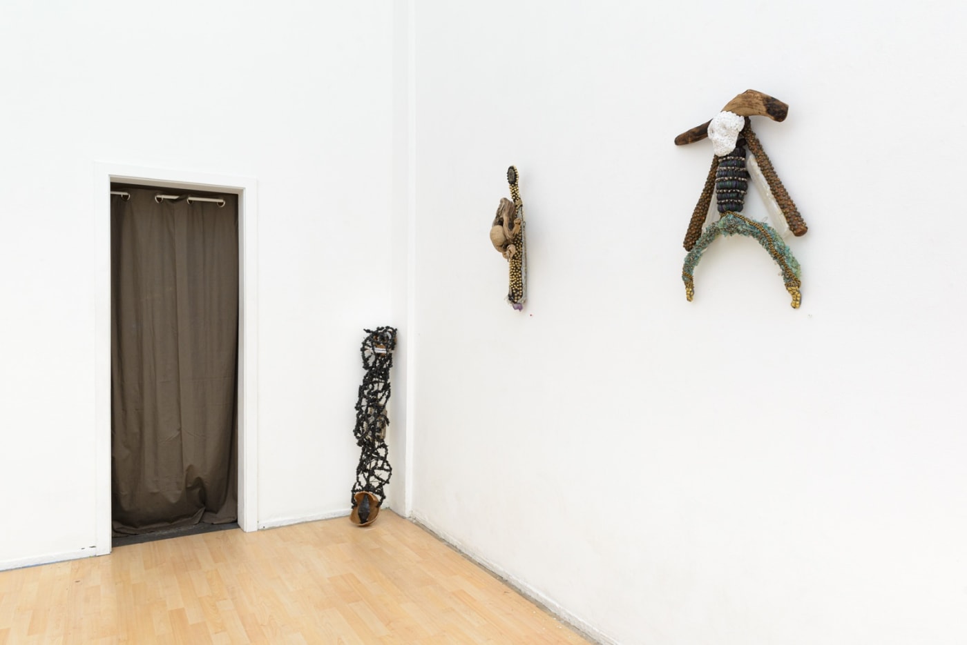 Installation view of Lucien Shapiro's solo show "Oculus", featuring found-object ritual sculptures