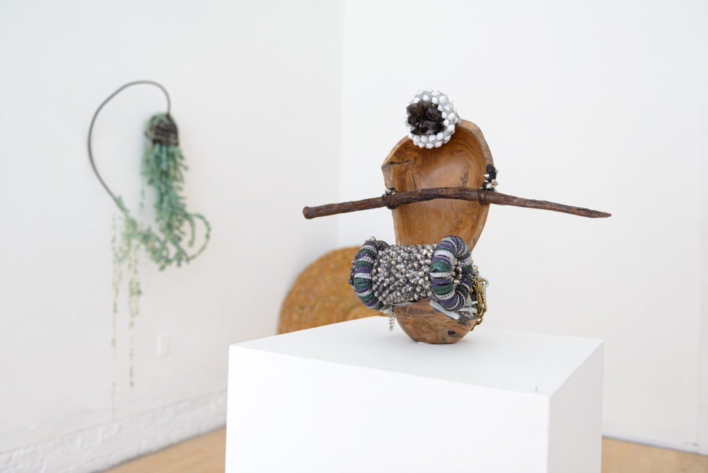 Installation view of Lucien Shapiro's solo show "Oculus", featuring found-object ritual sculptures