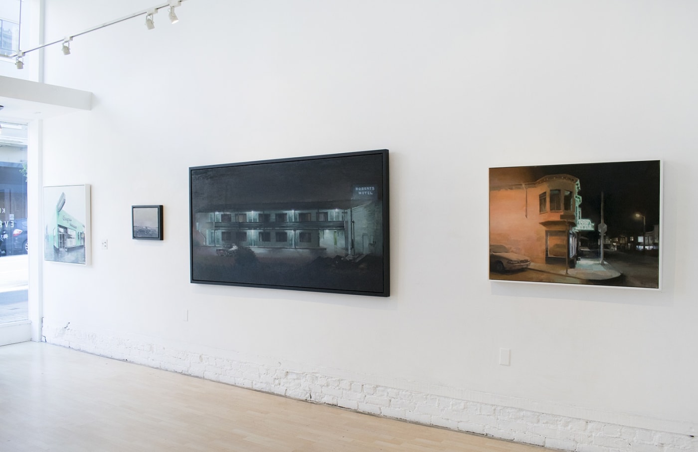 Installation view of oil paintings from Kim Cogan's solo show "Evergreen"