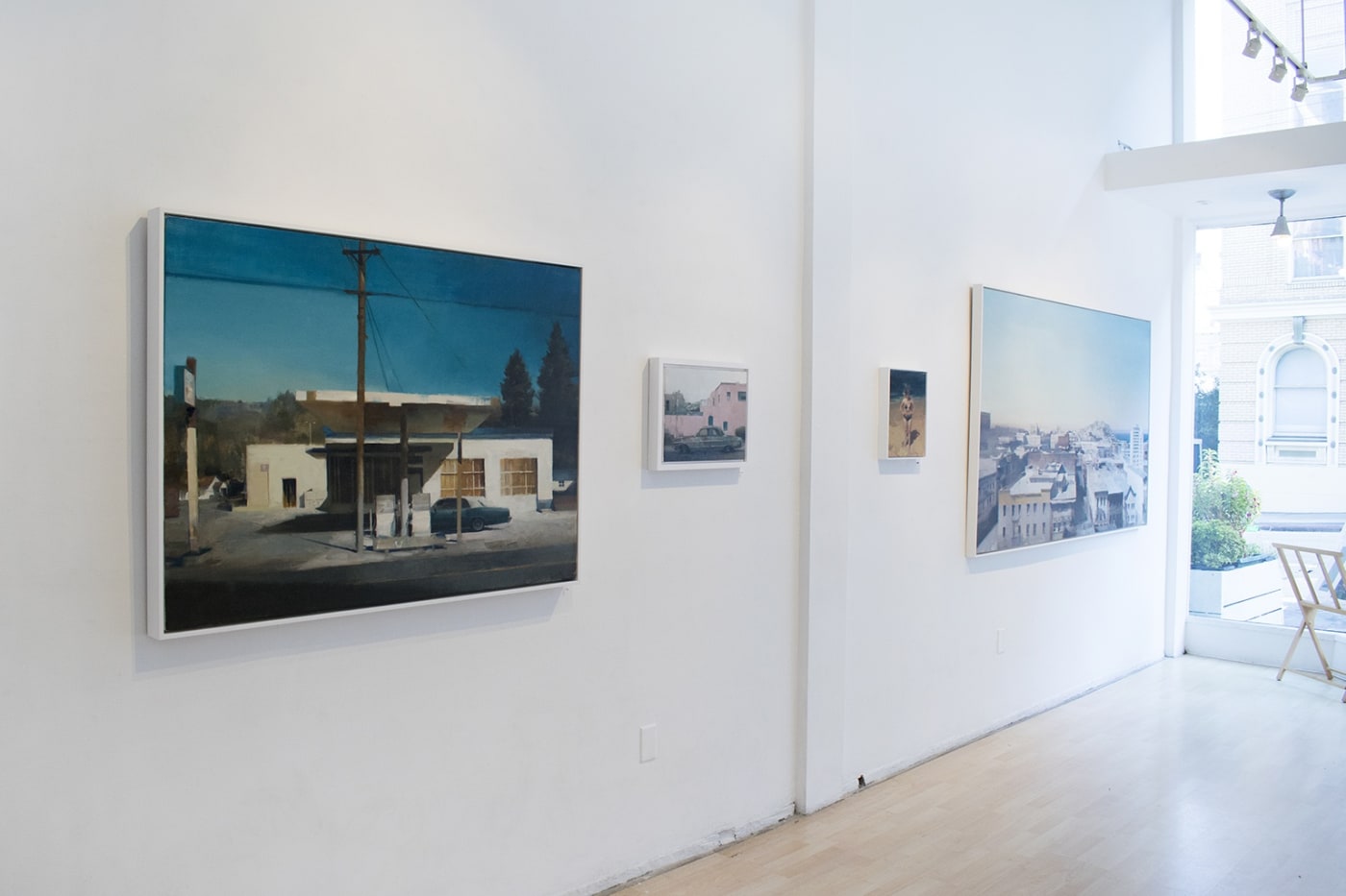 Installation view of oil paintings from Kim Cogan's solo show "Evergreen"