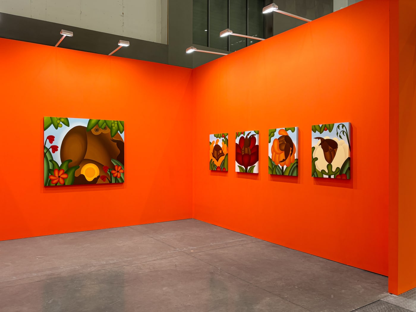 installation view of Bianca Nemelc's solo show in Taipei, bright orange walls with colorful paintings of abstracted flowers