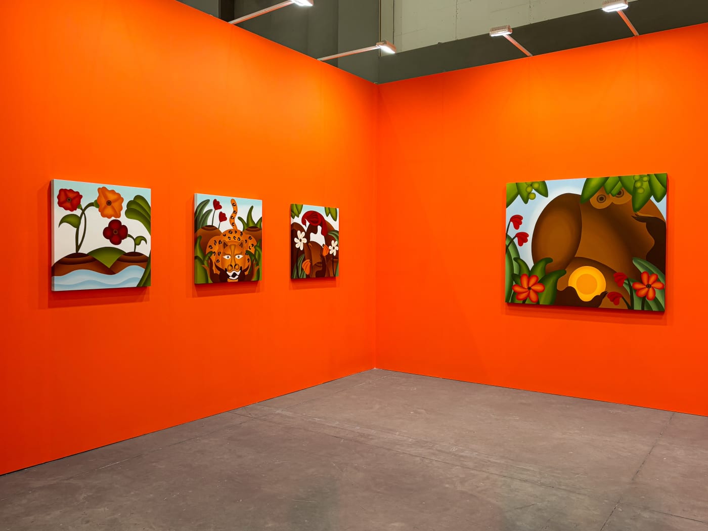 installation view of Bianca Nemelc's solo show in Taipei, bright orange walls with colorful paintings of abstracted flowers