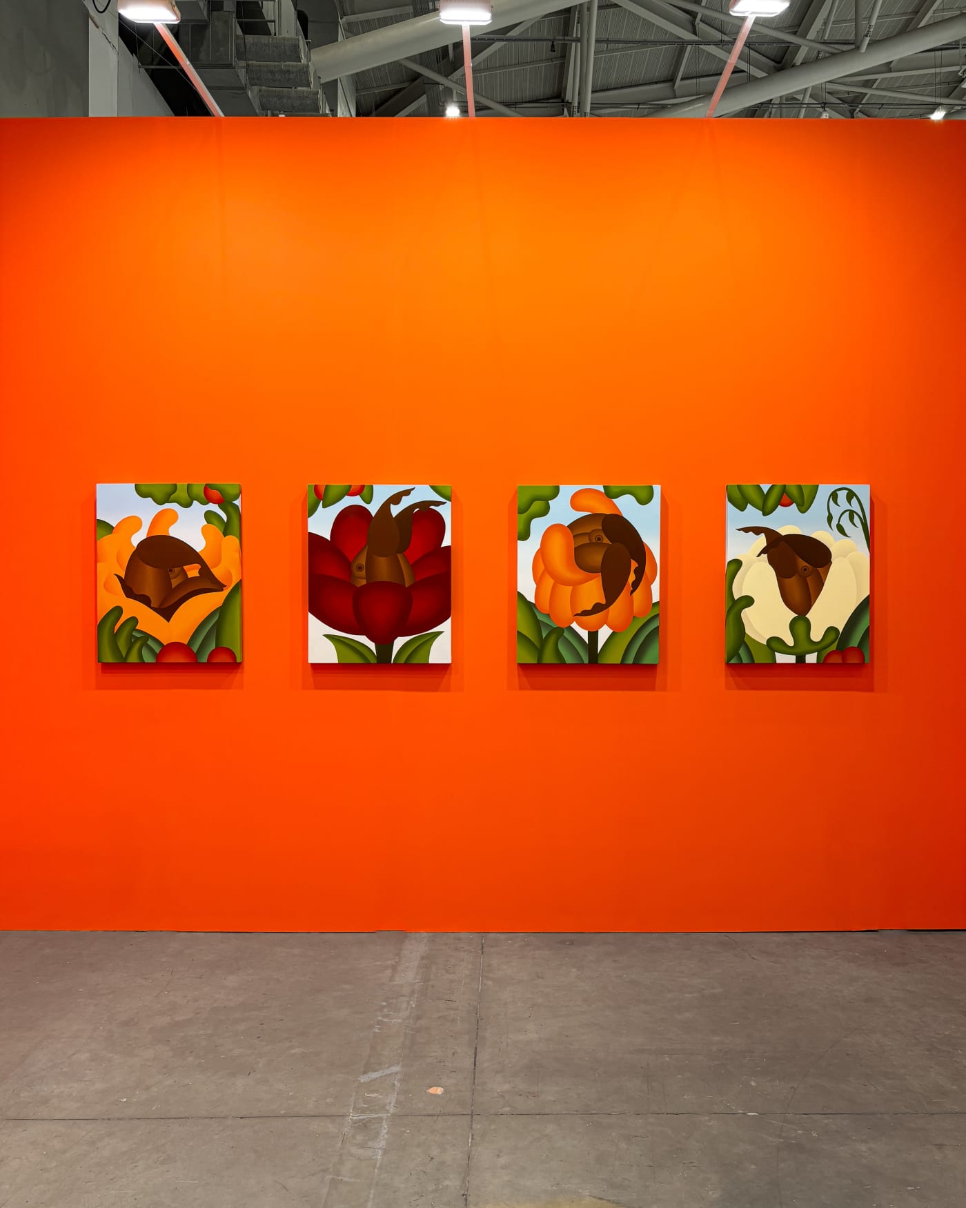 installation view of Bianca Nemelc's solo show in Taipei, bright orange walls with colorful paintings of abstracted flowers